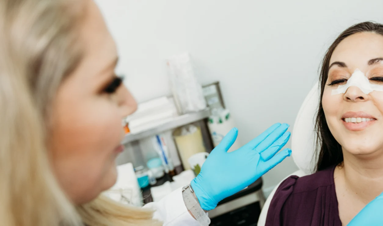 Dr. Melyssa Hancock - at female patient treatment