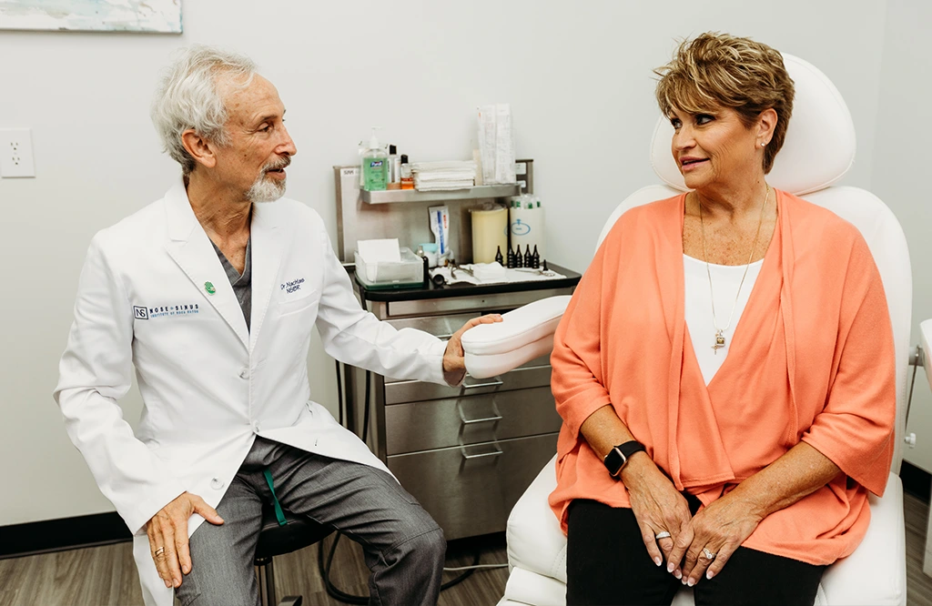 Dr Nachlas in Consultation With Female Delray Beach Nose Surgery Patient